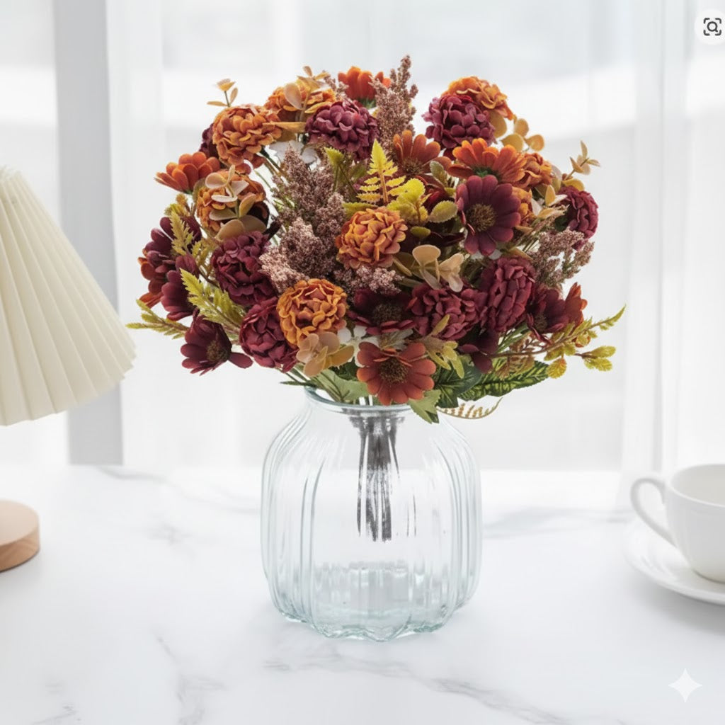 Handgebonden luxe kunstboeket Blossom Breeze met roze bloesems en witte madeliefjes, gepresenteerd als vooraanzicht op een marmeren tafel.